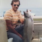 Captain Kurt's father, "Wally Walleye", in the mid 70's with a King Salmon